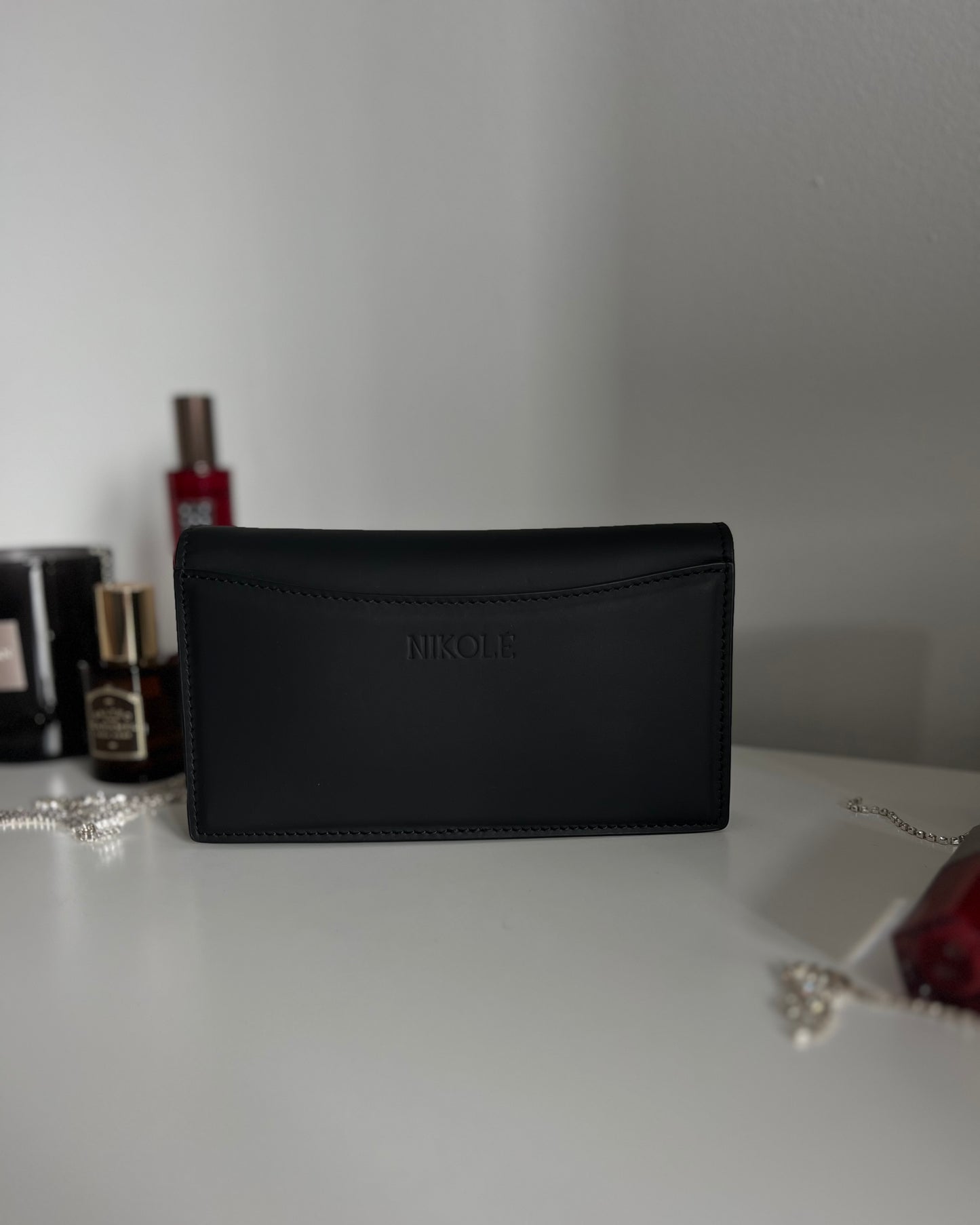 Black Leather Crossbody Bag with Gold Clasp