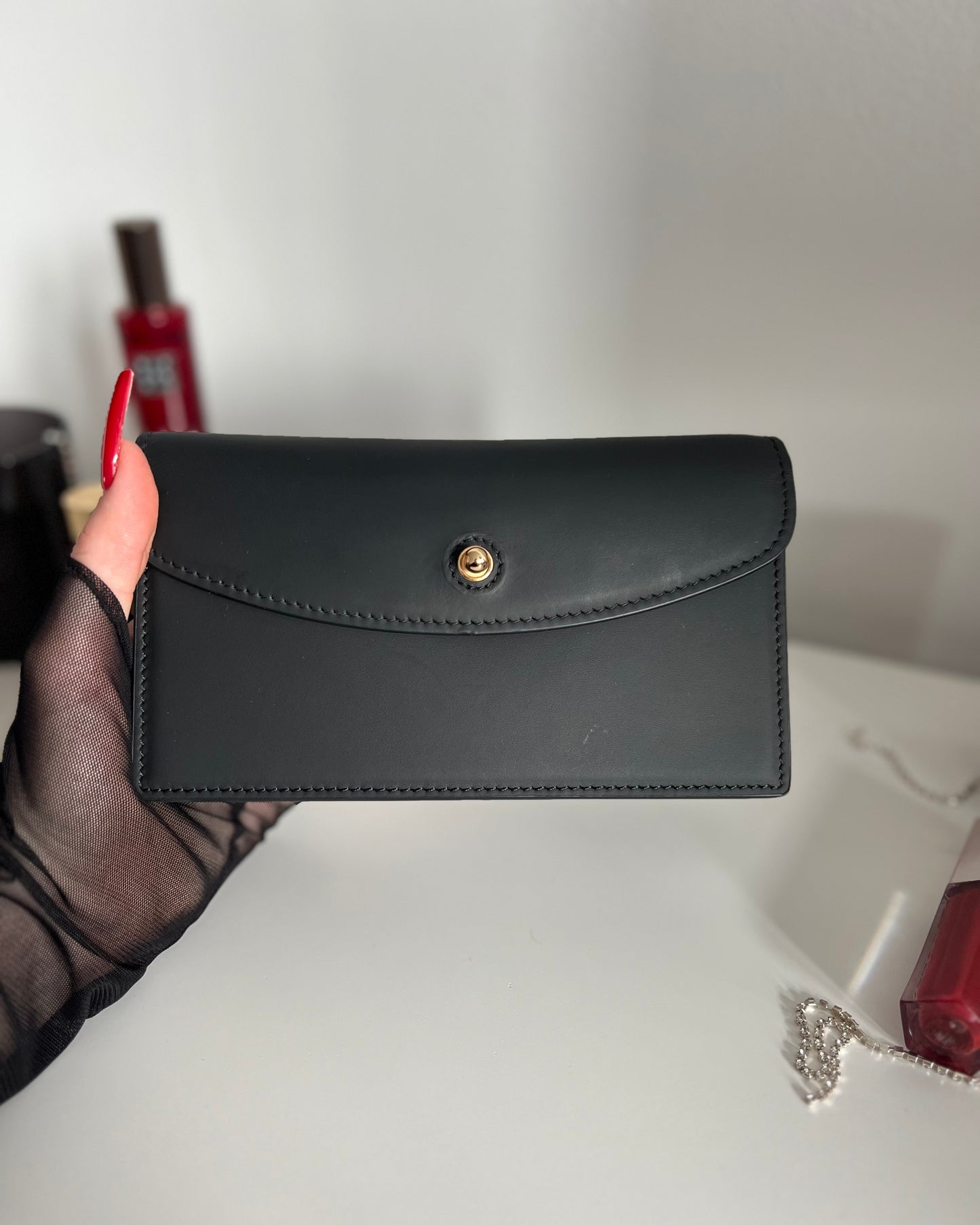 Black Leather Crossbody Bag with Gold Clasp