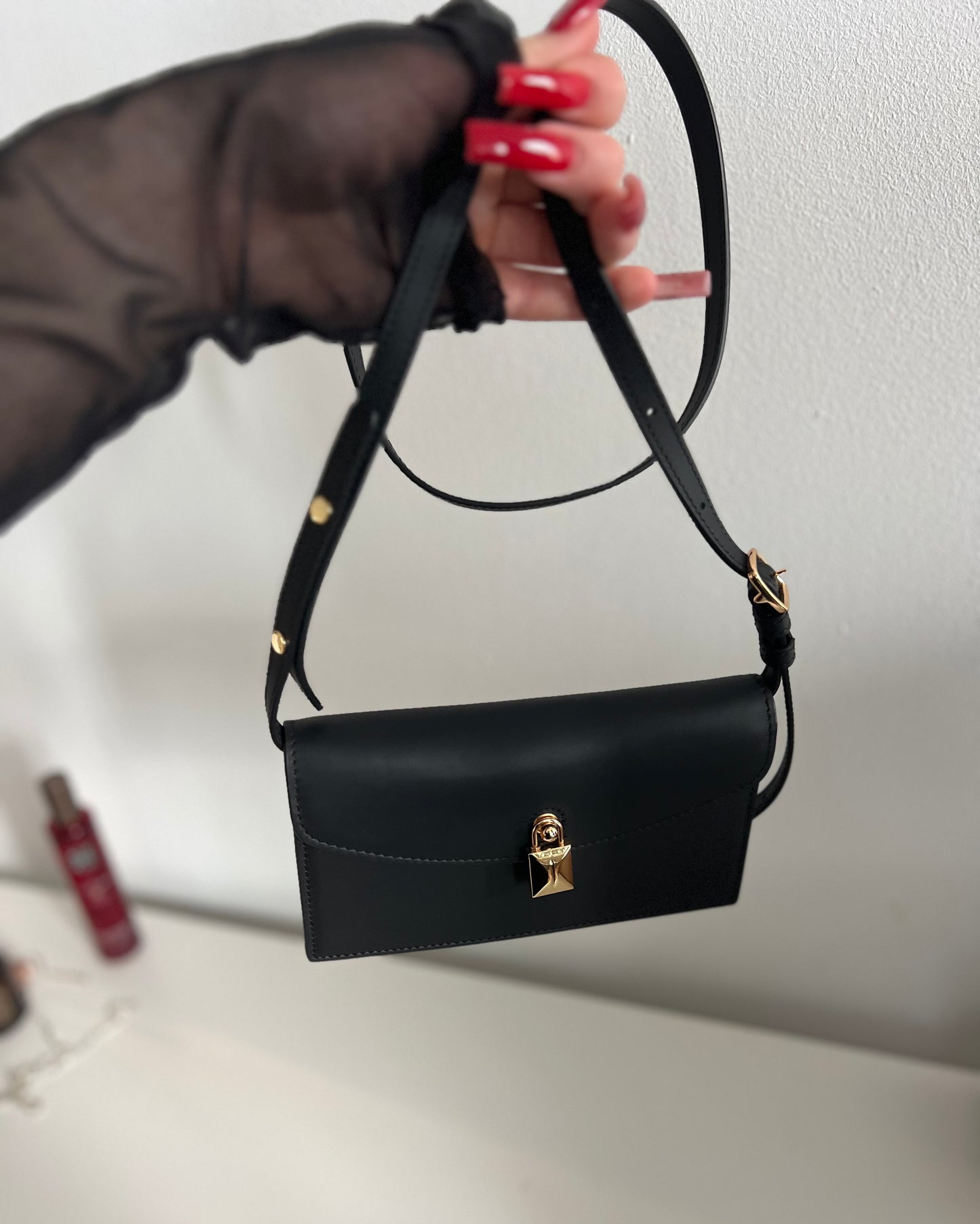 Black Leather Crossbody Bag with Gold Clasp